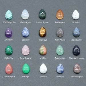 Set of twenty teardrop shaped natural crystal cabochons in various gemstones for jewelry making
