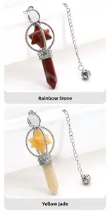 Macro shot of Rainbow Stone and Yellow Jade hex crystal pendants with silver metal chains