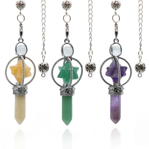 Natural crystal Merkaba star pendulums in yellow, green, and purple with ornate silver metal