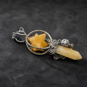 Natural crystal merkaba star pendant with silver frame inside protective opp bag packaging