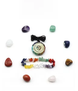 Detail of 7 chakra crystal set including an Orgone Om pendant and beaded gemstone bracelet