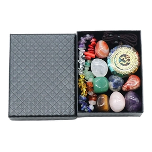 Chakra healing crystal set with polished stones, Om pendant, and elegant black gift box