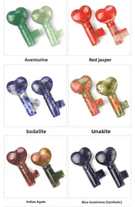 Hand-carved heart-shaped natural gemstone keys in various semi-precious minerals