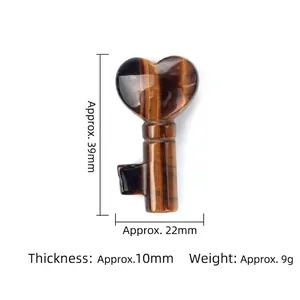 Tiger eye stone heart-shaped key carving with golden silk luster and natural texture