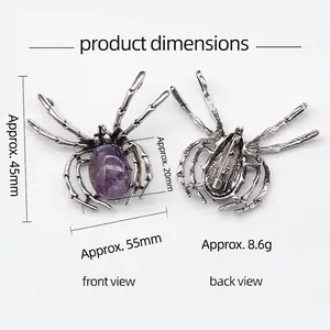 Vintage spider brooch pendant with purple gemstone and silver alloy texture