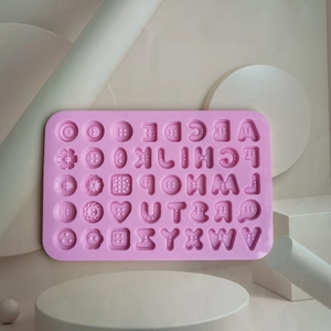 Pink silicone alphabet and flower chocolate mold for cake decorating and DIY baking