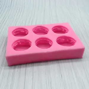 Pink 6-cavity silicone macaron mold for baking handmade chocolate and soap making