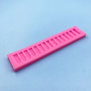 Pink silicone fence mold for fondant and chocolate baking tool in rectangular shape