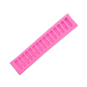 Pink silicone mold with 15 hexagonal crystal column cavities for DIY cake decorating