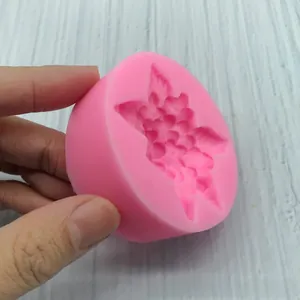Detail of pink silicone mold for 3D daisy flowers and scented plaster DIY crafts