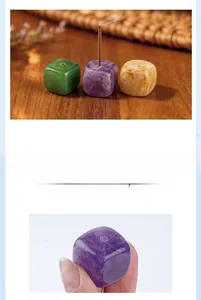 Macro detail of cube-shaped natural crystal incense holder in amethyst and jade stone
