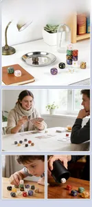 Close-up of assorted natural crystal dice with gold dots for tabletop gaming and decor
