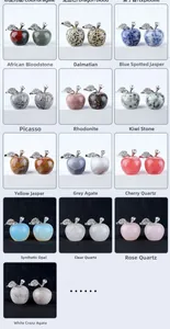 Macro display of 25mm natural crystal apple stones with silver metal leaves