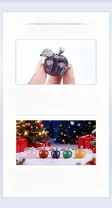Macro shot of 25mm natural crystal apples with rhinestone alloy leaves for Christmas gifts
