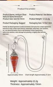 Detail of red natural stone dowsing pendulum with vintage silver floral cap and metal chain