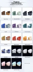 Macro shot of natural crystal house figurines in various carved gemstones and minerals