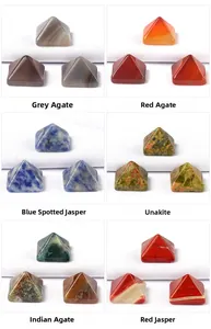 Macro view of pyramid-cut natural gemstones including Agate and Jasper crystals