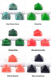 Detailed macro view of synthetic and dyed gemstone pyramid ornaments in six color styles
