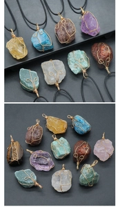 Detail view of handmade wire-wrapped natural crystal pendants on black cord necklace