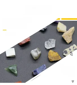 Collection of natural raw mineral stones including crystal, lapis, and agate specimens