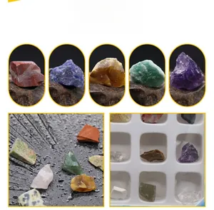 Educational set of natural crystal mineral specimens in a white plastic storage box