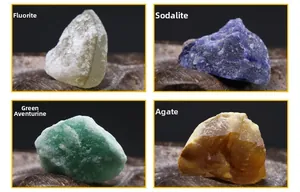 Detail of natural raw fluorite, sodalite, green aventurine, and agate mineral specimens