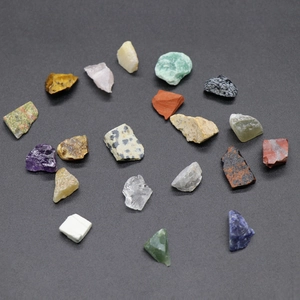 Natural raw crystal stone collection featuring amethyst and tiger eye for geology education