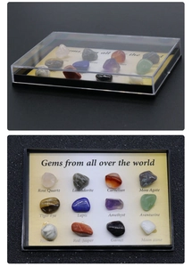 Detail of 12 natural crystal specimens and mineral stones in a black collector display box
