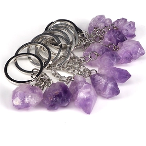 Raw amethyst crystal keychains with natural purple gemstones and silver metal rings
