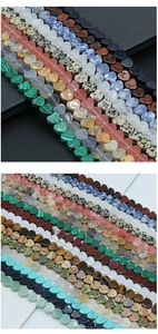 Detailed view of polished heart-shaped gemstone beads for DIY jewelry making and crafts