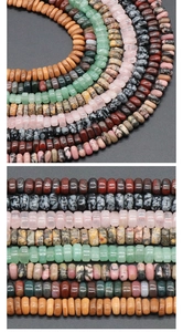 Macro detail of mixed natural crystal Heishi beads including rose quartz and aventurine