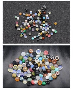Macro shot of assorted colorful gemstone cabochons for DIY nail art and jewelry making