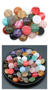 Macro view of multi-color 20mm round cabochon natural stones for jewelry making