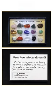 Detail showing 15 varieties of polished gemstones in educational specimen box with English labels
