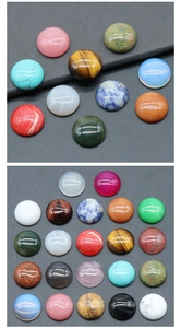 Macro shot of 18mm round natural stone cabochons for jewelry making and DIY crafts