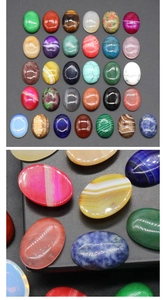 Macrodetail van ovale kristallen cabochons met gepolijste textuur voor DIY sieraden maken