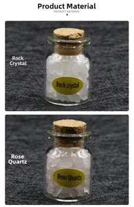 Detail of glass wishing bottles with rose quartz and rock crystal stone specimens