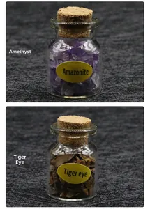 Close-up of Amethyst and Tiger Eye natural stone chips in mini glass bottles with corks