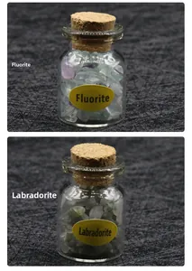 Detailed view of natural Fluorite and Labradorite crystals in small glass corked bottles