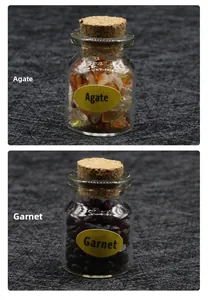 Detail of agate and garnet crystal specimens in corked glass jars with labels