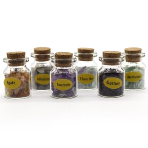 Set of 6 glass bottles with natural polished crystal stones like Agate and Labradorite
