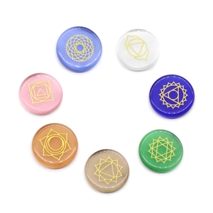 7 Chakra stone set with engraved golden yoga symbols on polished round opalite cat eye gems