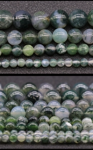 Macro detail of natural green moss agate beads showing unique water plant textures