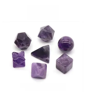Macro shot of polished Amethyst crystal geometry set in spheres and pyramids