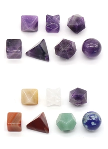 Detailed macro shot of sacred geometry healing stones set in polished natural gemstones