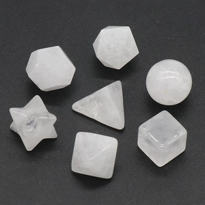 Set of 7 white natural crystal quartz geometric stones including sphere and star shapes