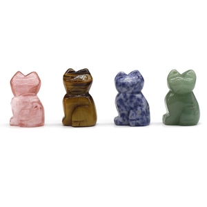 Polished semi-precious stone cat figurines in rose quartz, tiger eye, and aventurine