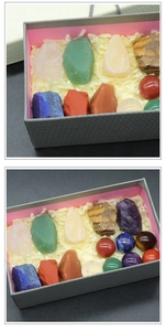 Detailed set of natural crystal chakra stones and polished spheres in a textured gift box