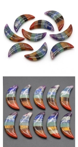 Polished crescent moon seven chakra healing stones in layered natural crystal minerals
