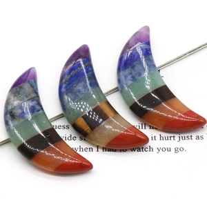 Handcrafted 7 Chakra healing crystal crescent moon pendant made of layered natural stones